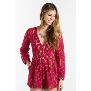 red long sleeve playsuit